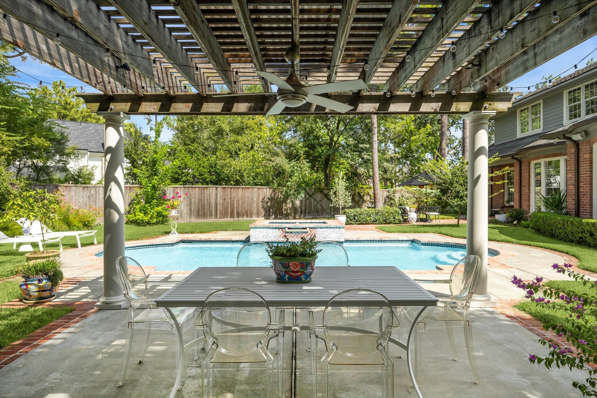 2 Blalock Pines Court Hedwig Village, TX 77024 - Photo 40 of 44 a building outdoor space with patio furniture and potted plants