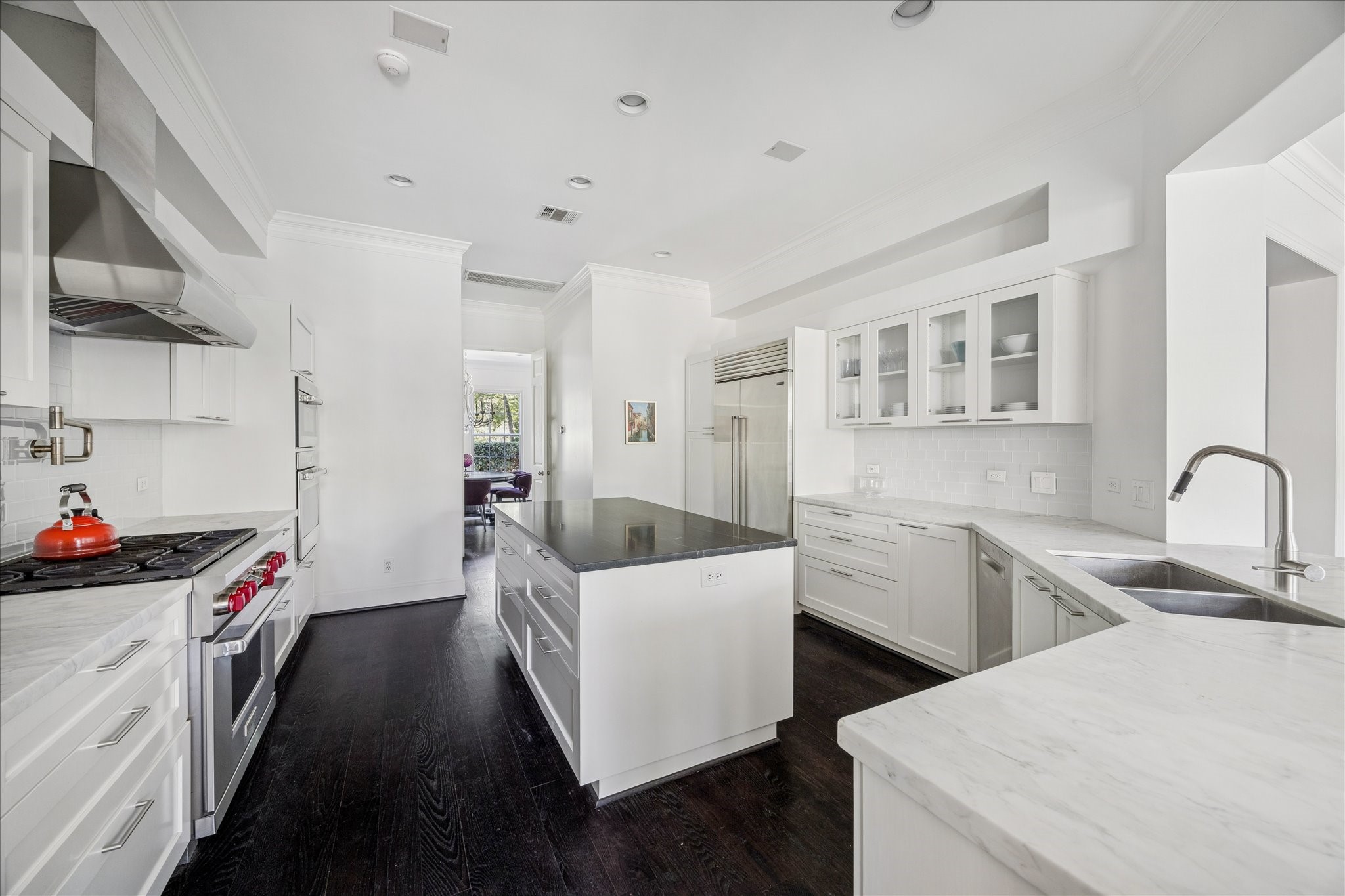 2 Blalock Pines Court Hedwig Village, TX 77024 - Photo 9 of 44 a kitchen that has a sink and a stove