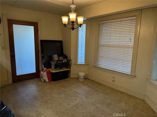 a bathroom with a toilet sink and vanity