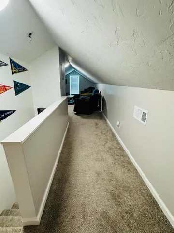 a bed room with bed and a couch