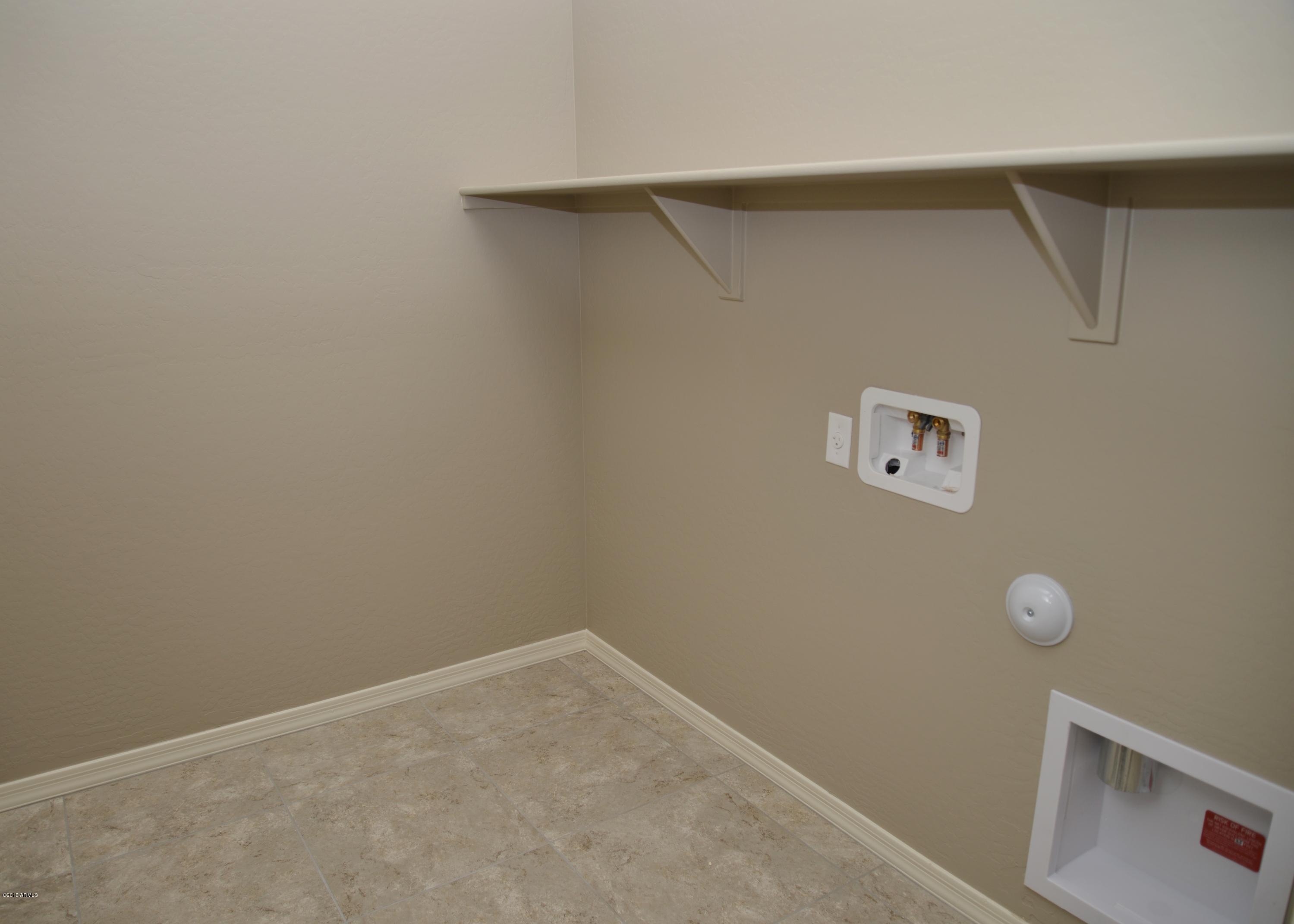 15639 West Berkeley Road Goodyear, AZ 85395 - Photo 9 of 14 Lot 324 - Laundry