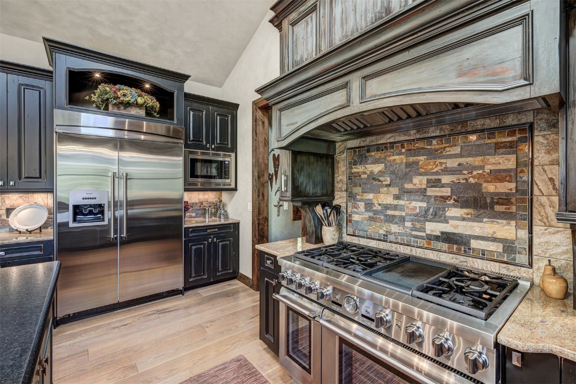 67 Rounds Road Breckenridge, CO 80424 - Photo 12 of 47 a kitchen with a stove and a refrigerator