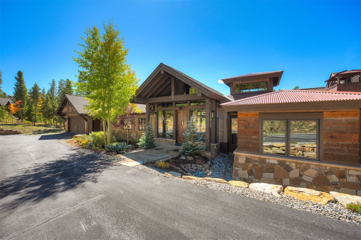 67 Rounds Road Breckenridge, CO 80424 - Photo 2 of 47 a front view of a house with garden