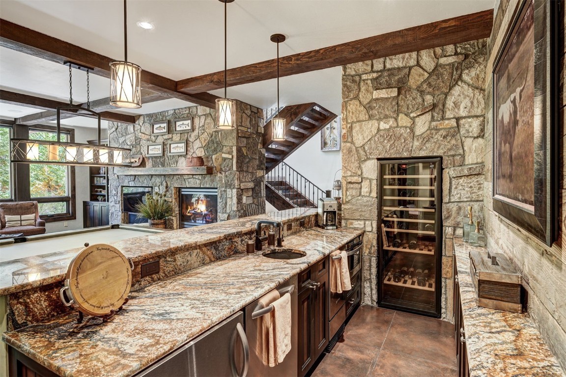 67 Rounds Road Breckenridge, CO 80424 - Photo 22 of 47 a kitchen with stainless steel appliances granite countertop a sink and a stove