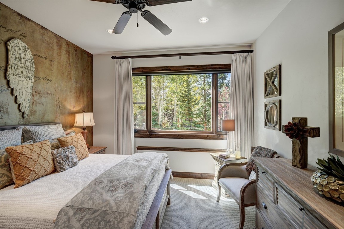 67 Rounds Road Breckenridge, CO 80424 - Photo 27 of 47 a bedroom with a bed and a window