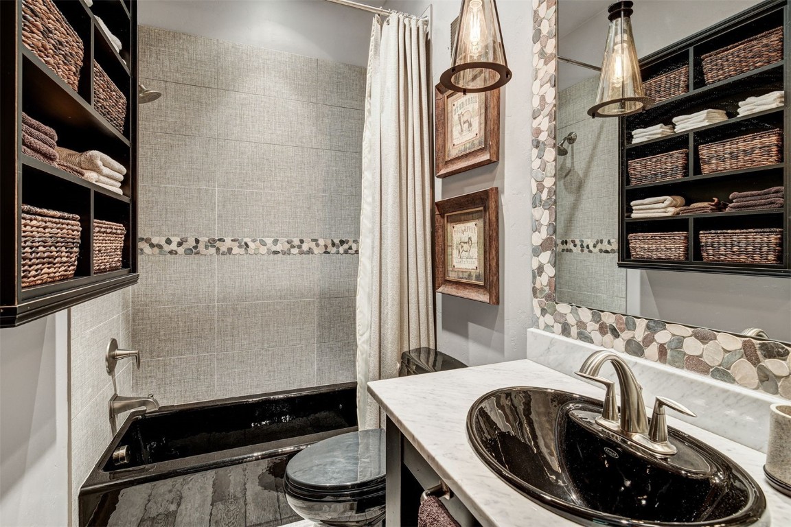 67 Rounds Road Breckenridge, CO 80424 - Photo 34 of 47 a bathroom with a sink a toilet and shower