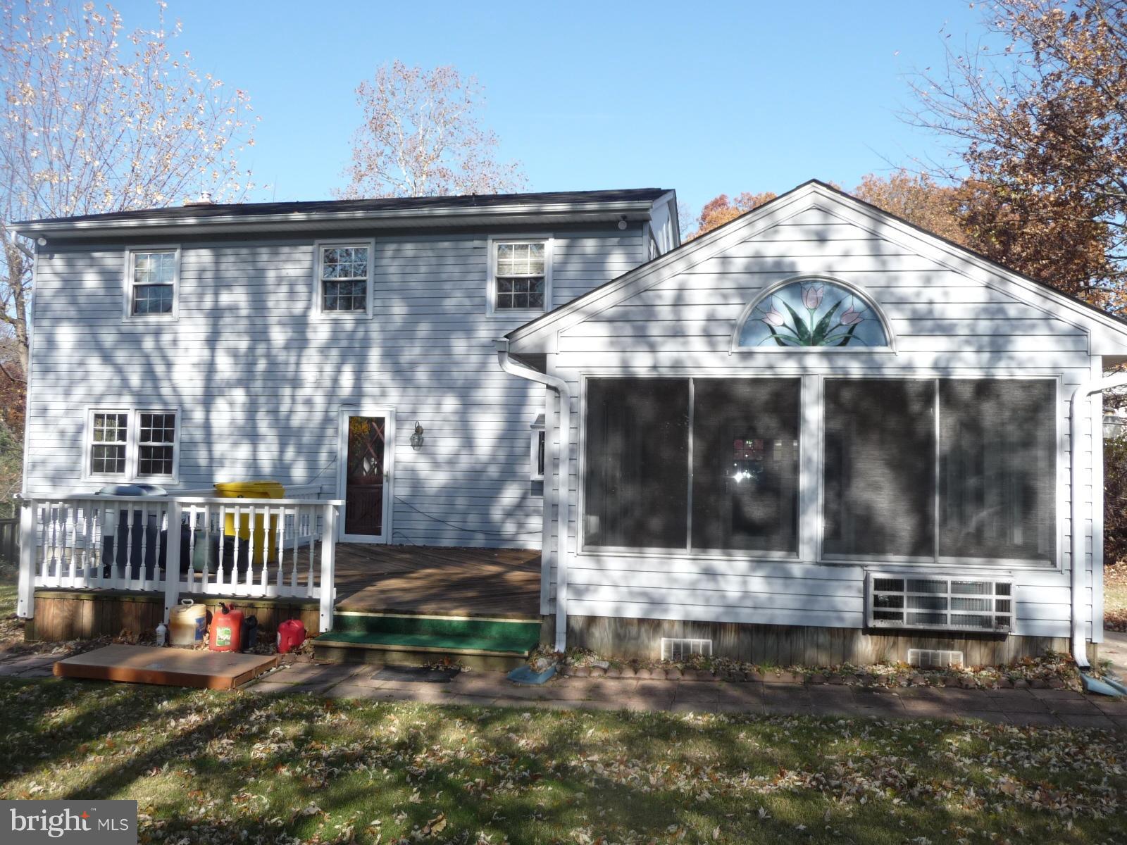 625 Cleveland Road Linthicum Heights, MD 21090 - Photo 2 of 28 a view of brick house with large windows and a small yard