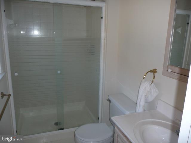 625 Cleveland Road Linthicum Heights, MD 21090 - Photo 17 of 28 a bathroom with a sink toilet and shower
