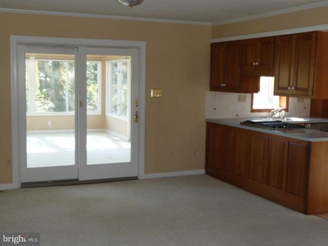 625 Cleveland Road Linthicum Heights, MD 21090 - Photo 24 of 28 a kitchen with granite countertop a sink and a vanity