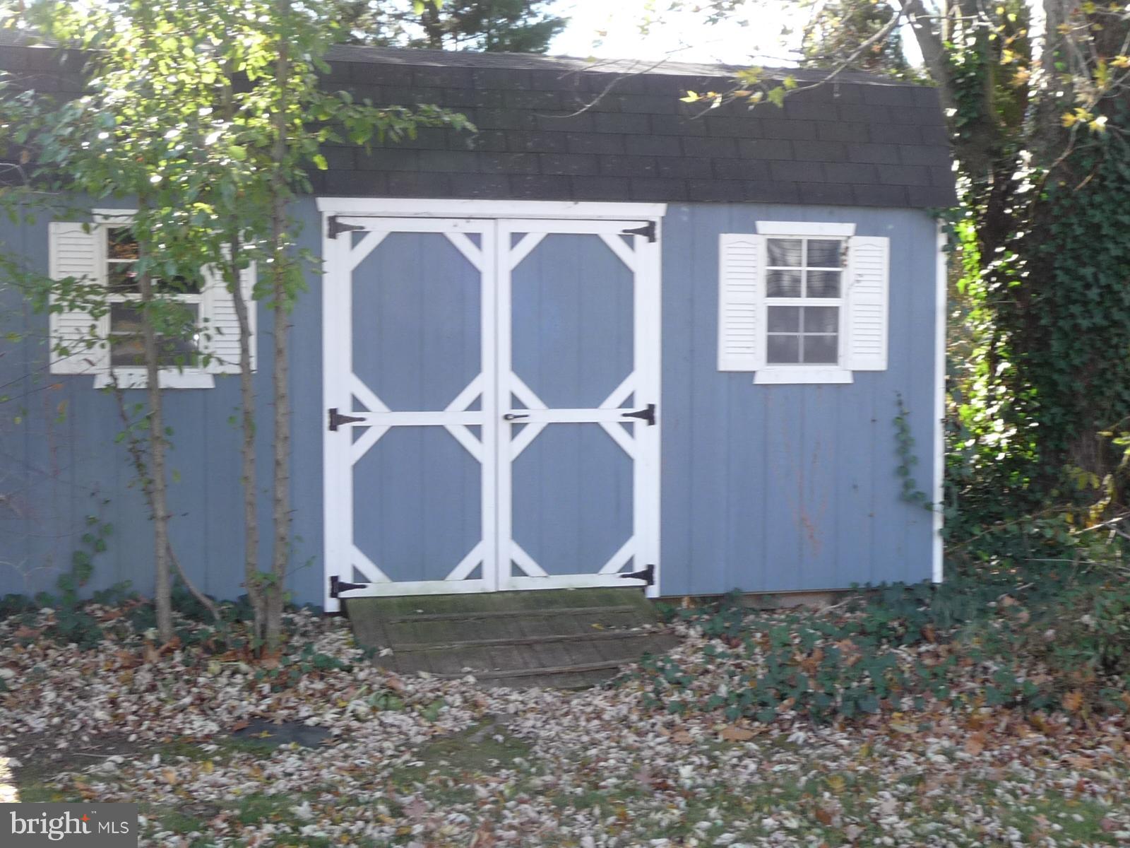 625 Cleveland Road Linthicum Heights, MD 21090 - Photo 28 of 28 a front view of a house with garden
