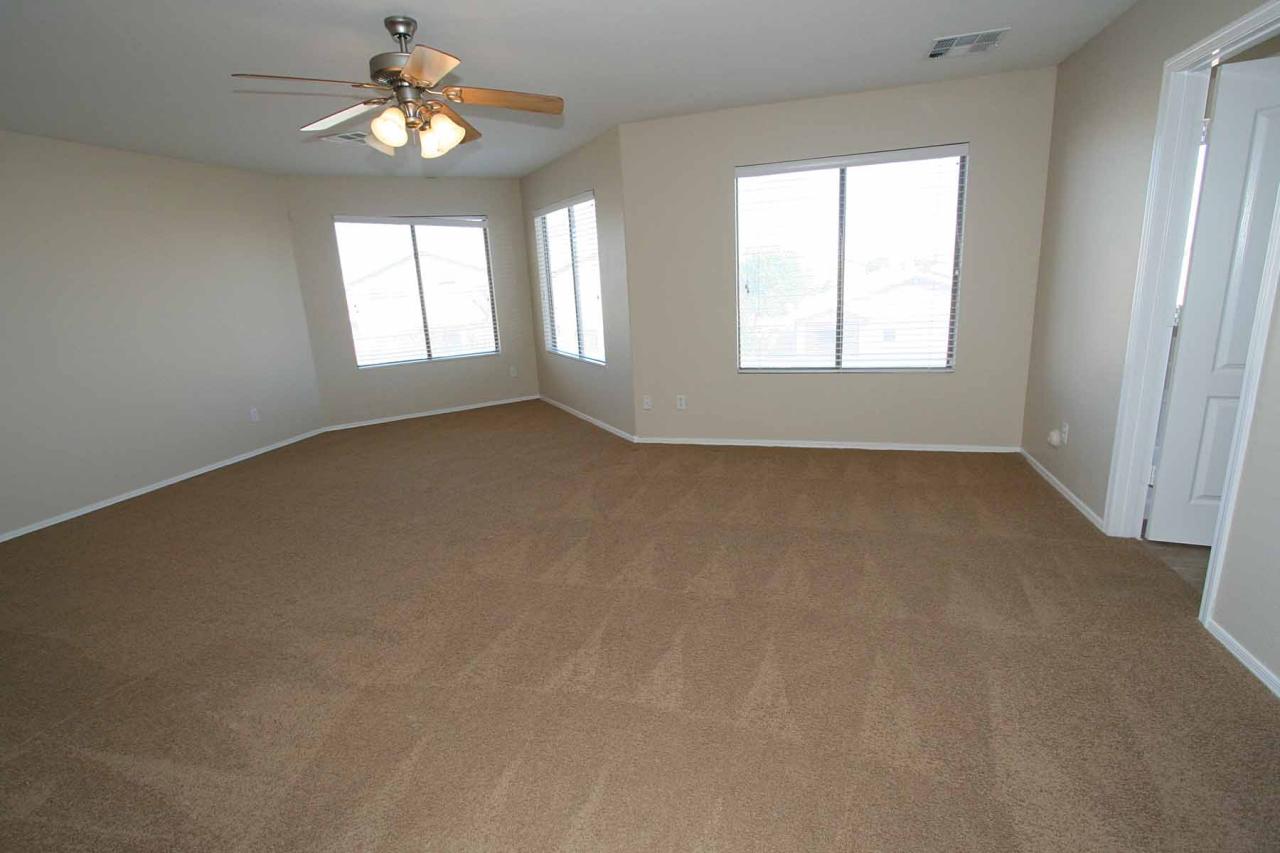 408 East Shawnee Road San Tan Valley, AZ 85143 - Photo 26 of 46 Master bedroom