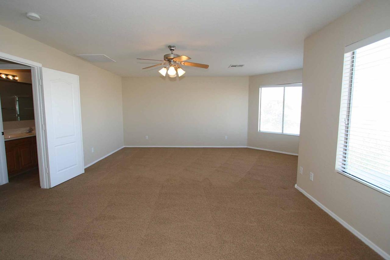 408 East Shawnee Road San Tan Valley, AZ 85143 - Photo 27 of 46 Master bedroom
