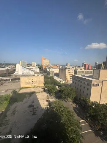 a view of water heater and hardwood floor
