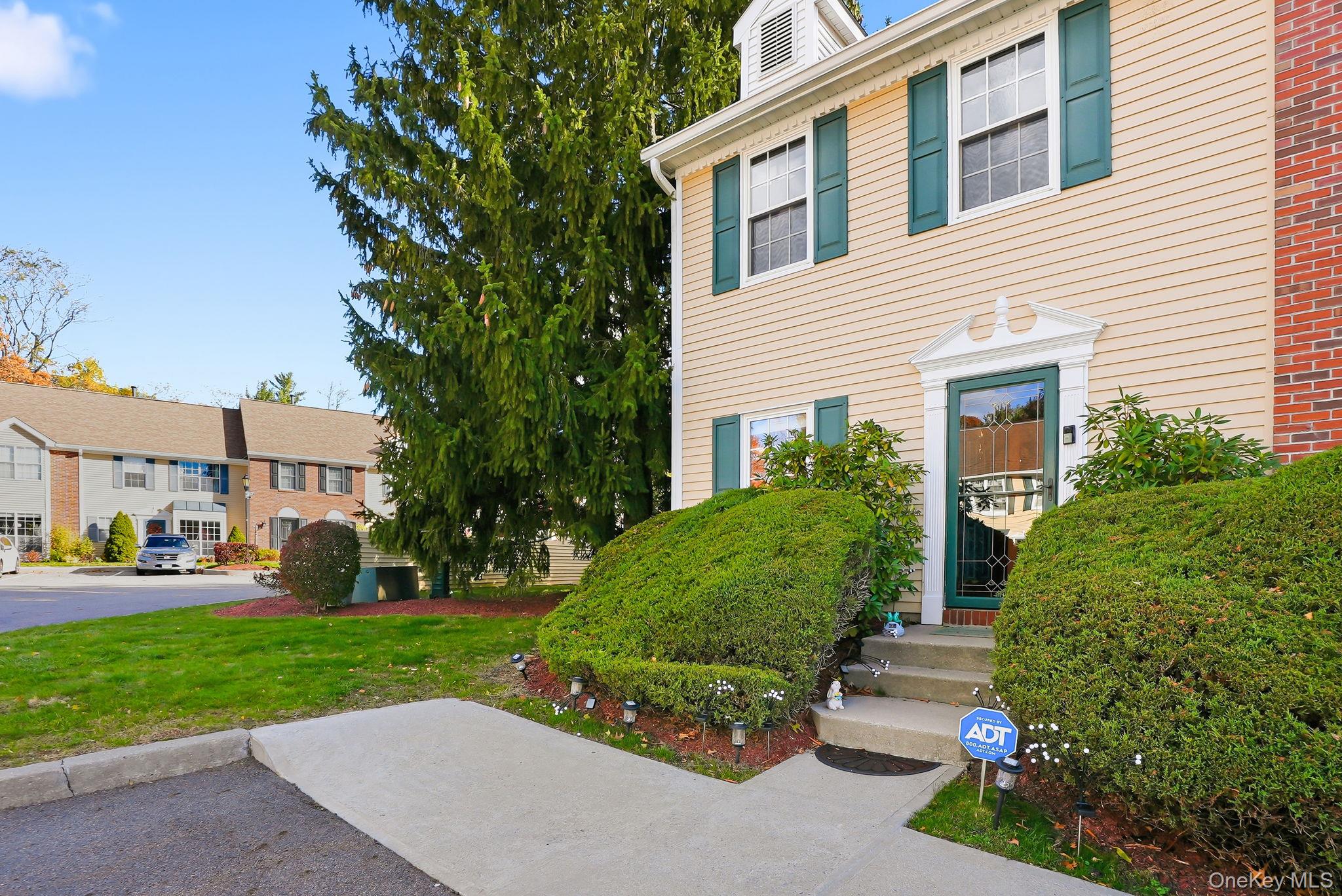 a view of a house with a garden