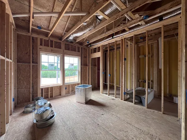 a view of a room with wooden walls