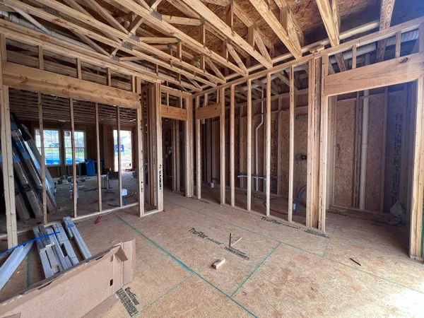 a bathroom with a shower curtain and a sink