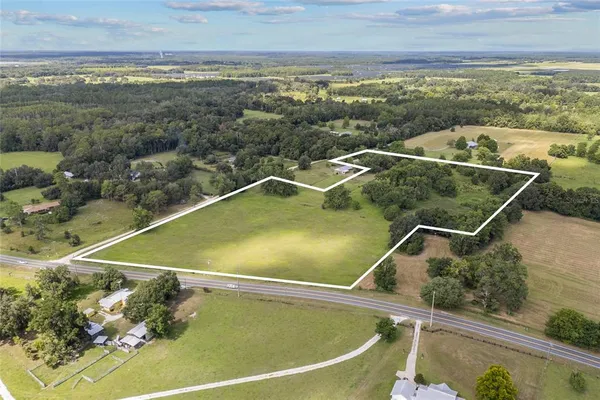 a view of a lake from a yard