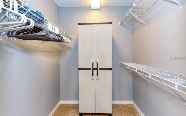 a view of a room with rack on the wall