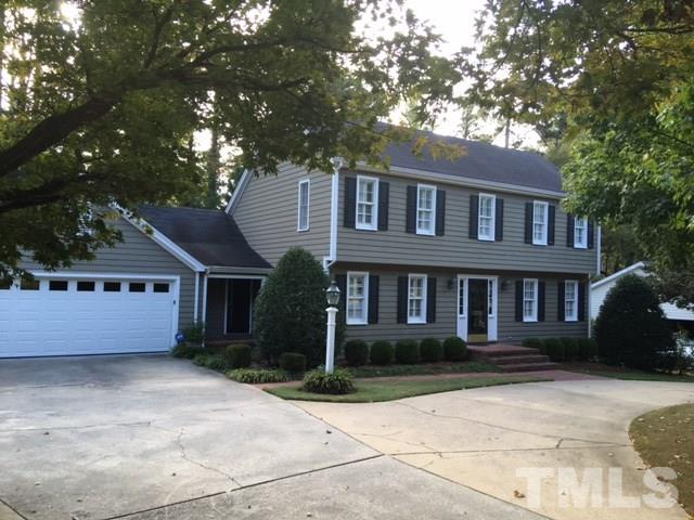 3732 Lassiter Mill Road Raleigh, NC 27609 - Photo 1 of 11 a front view of a house with a garden