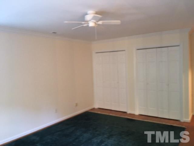 3732 Lassiter Mill Road Raleigh, NC 27609 - Photo 9 of 11 a view of a small space with wooden floor and a fan