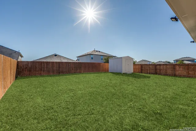 a house view with a garden space
