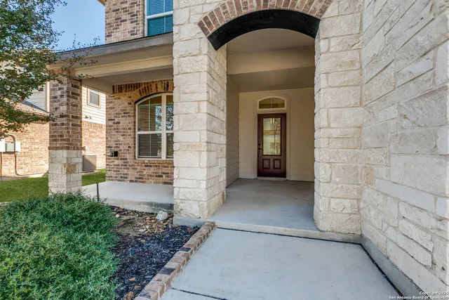 a view of front door of a house with stairs