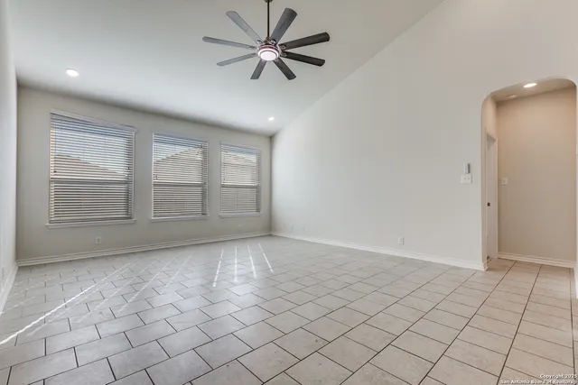 a view of a hallway with a bathroom