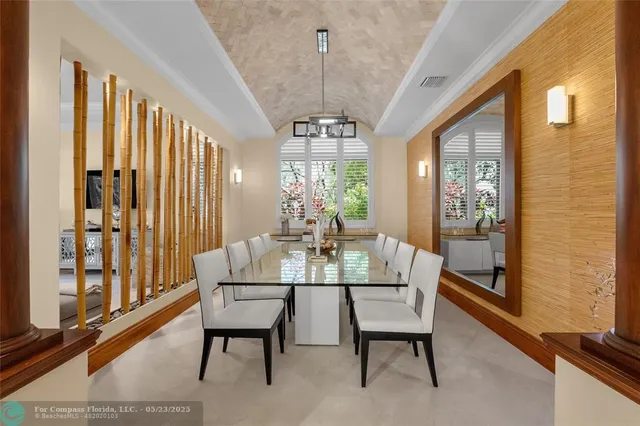 a kitchen with granite countertop a sink stove and cabinets