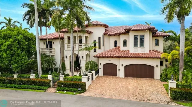 a chair and table sitting in front of a house