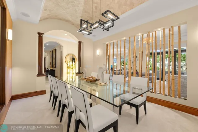 a large kitchen with a lot of counter space and a sink