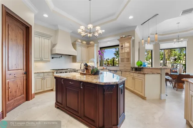 a living room with fireplace furniture and a flat screen tv