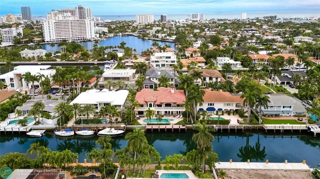 a view of a swimming pool with a sitting area