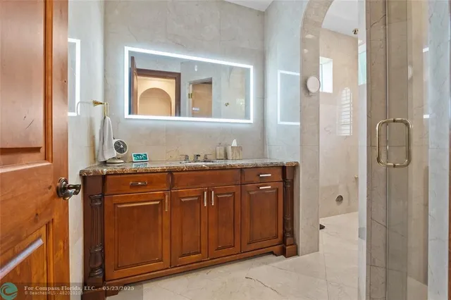 a view of a hallway with a washer and dryer
