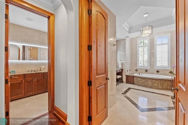 a view of a livingroom with a washer and dryer