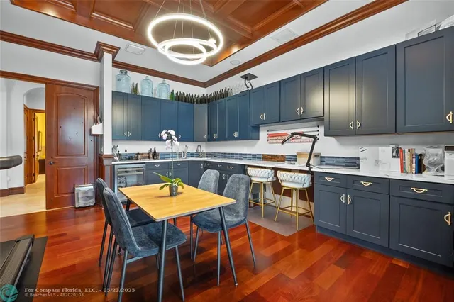 a view of a house with backyard porch and sitting area