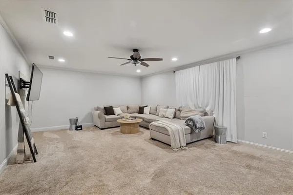 a kitchen with stainless steel appliances granite countertop wooden cabinets and a stove top oven