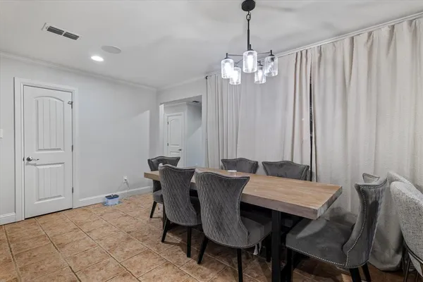 a kitchen with stainless steel appliances granite countertop a sink and cabinets with wooden floor