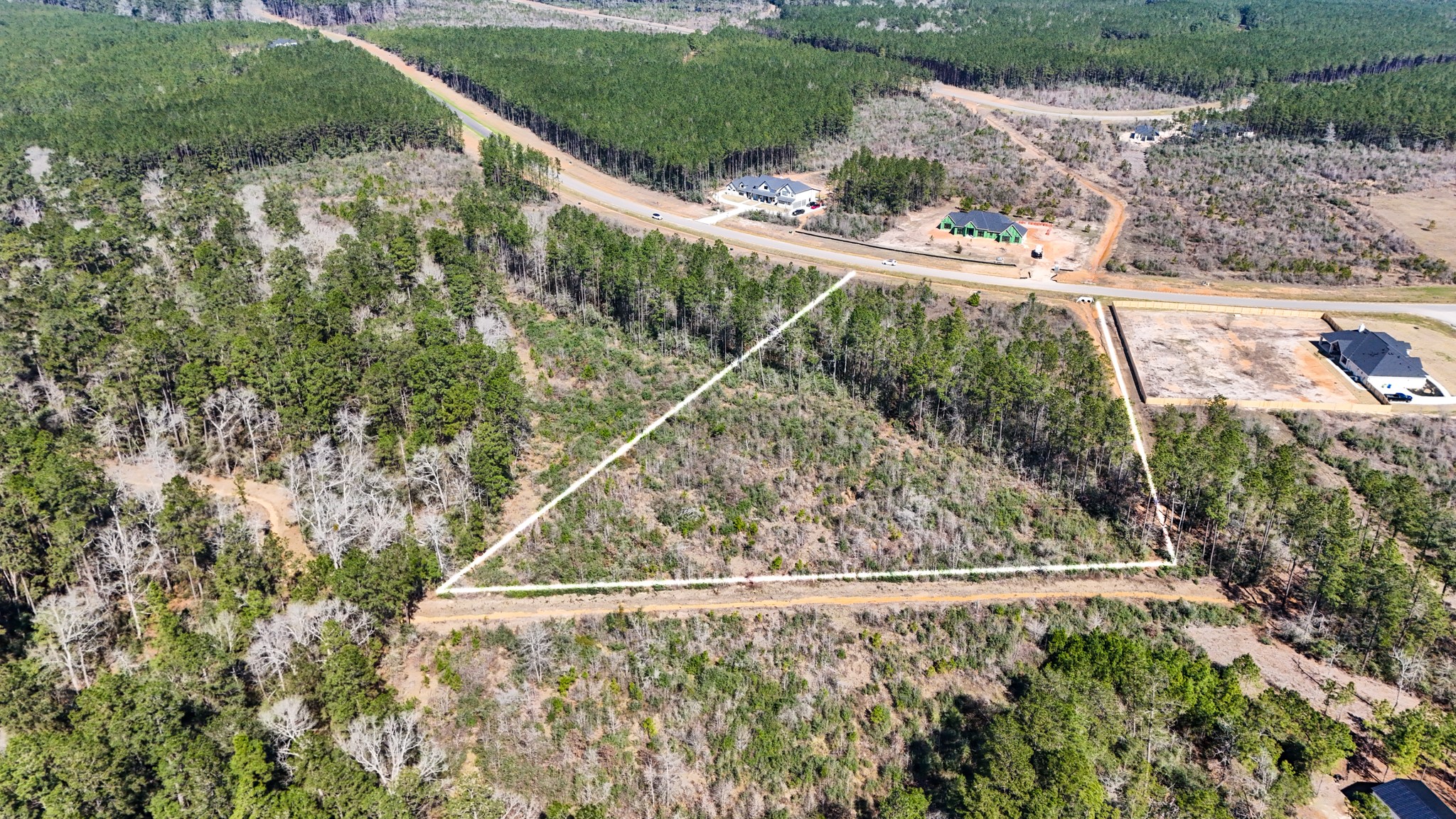 15973 Ridge Oak Road Willis, TX 77378 - Photo 14 of 23 This view shows the drainage along the back of the property and to the right from this view.