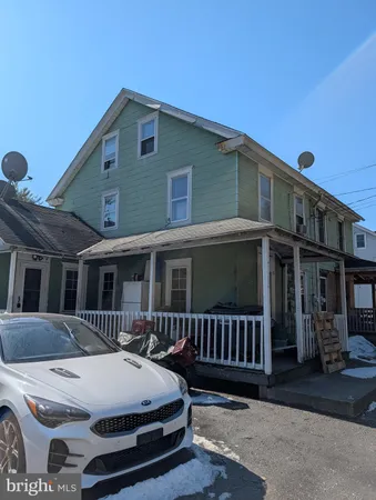 a front view of a house with balcony