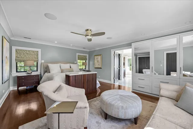 a bathroom with a granite countertop sink a toilet and a mirror
