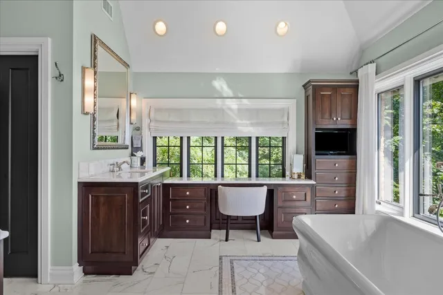 a bathroom with a shower and toilet