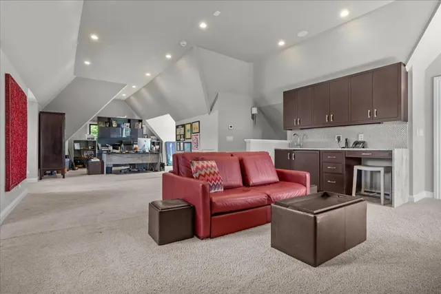 a view of a lake in middle of the green field