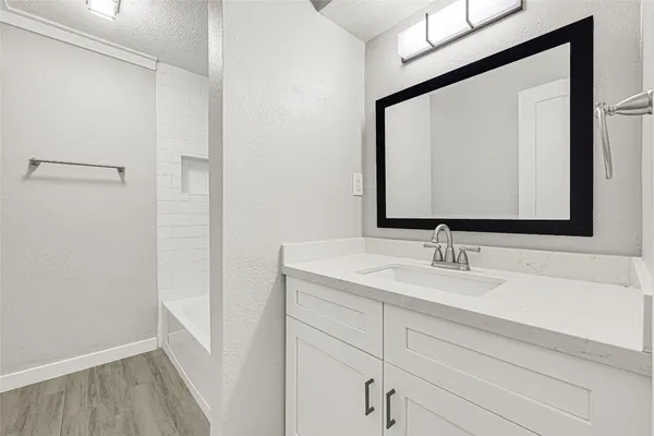 a bathroom with a bathtub