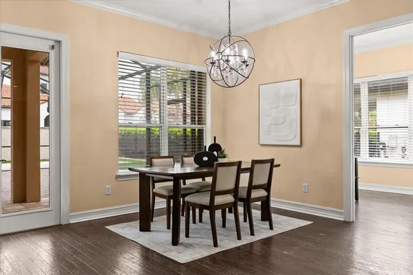 a bedroom with a bed and a night stand