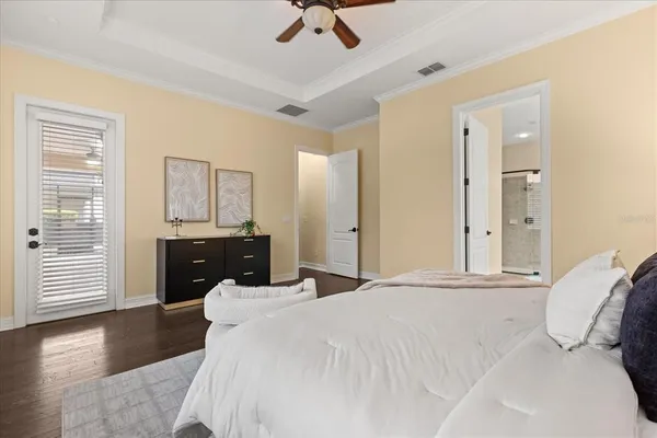 a bathroom with a shower a sink and a mirror