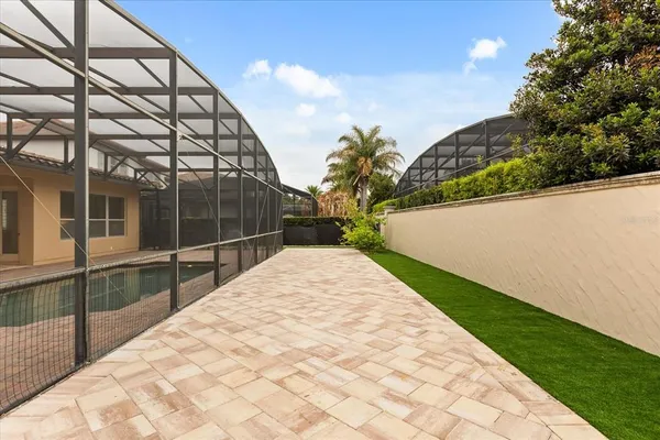an empty room with wooden floor and a window