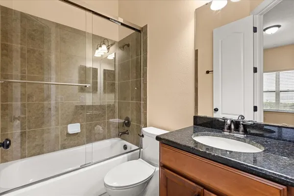 an empty room with wooden floor