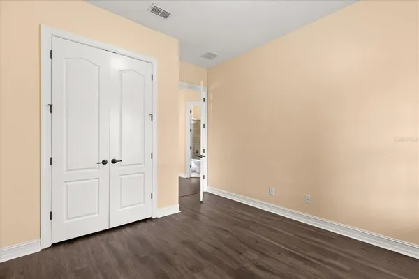 a view of a room that has a large window in it