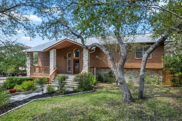 front view of a house with a yard