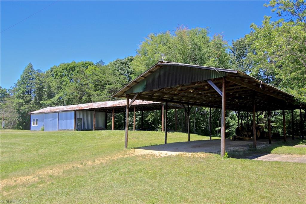 503 McKinney Road Reidsville, NC 27320 - Photo 27 of 28 Two of the three barns and pole sheds. Concrete slab for shed #2, Pole shed has 4 concrete trailer spaces.
